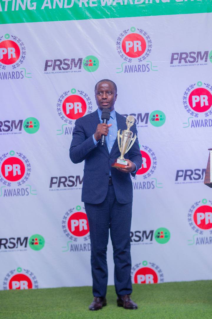 MEC spokesperson, Sangwani Mwafulirwa gives an acceptance speech after the awards.jpg